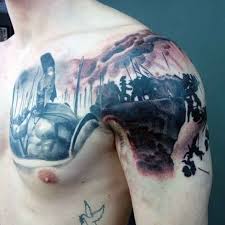 Man With Spartan Tattoo On Shoulder Tattoosformen Spartan Tattoo Tattoos For Guys Tattoos