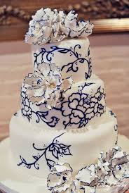 Each cake was topped with white sugar roses, blue filler flowers and silver berries. Navy Wedding Cake Decorations Wedding Ideas By Colour Chwv