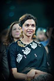 Deepika Padukone In A Swan Border Black Saree And Blouse Love Her Statment Jhumkas Indian Celeb Deepika Padukone Saree Deepika Padukone Style Blouse Designs