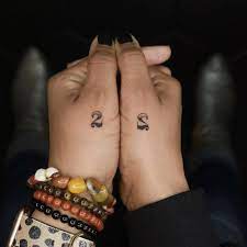 The tattoo of the celtic cross was the first tattoo that robbie got, back when he was a member of take that. Individual Matching Number 22 Tattooed On Kamilah