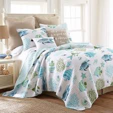 The comforter features a shell pattern that is printed in shades of blue onto a white, cotton brushed twill. Best Coastal Bedding Ideas Beach House Comforter And Quilt Sets