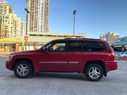 Image result for Medium Red 2002 Envoy