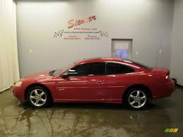 Image result for Dark Garnet Red 2002 Stratus