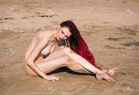 Young Nude Woman Posing On A Sandy Beach. Sexy Redhead Enjoying Hot Summer  Day Outdoors Stock Photo, Picture and Royalty Free Image. Image 105914810.