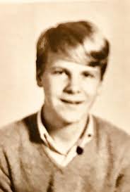 Can you identify the people in the class photo?