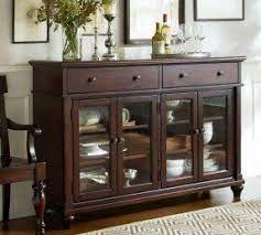 The top of this sideboard buffet can hole baskets of essentials or display items. Sideboards And Buffets With Glass Doors Ideas On Foter Pottery Barn Dining Room Dining Room Buffet Home Furniture