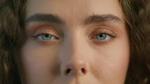 Slow motion smiling light blue eyes, Goo...