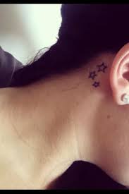 Small hamsa tattoo behind the ear. 58 Star Tattoos Behind The Ear
