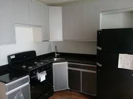 New quartz countertop and tiled backsplash. Kitchen Cabinet Refacing In Brooklyn Ny Acero Kitchen Cabinets