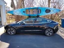 I can only imagine that the people eating outside in the marina restaurant all got a good laugh watching me struggle for so long before finally getting the yak up on top try it out for yourself and watch how easily your kayak loads up on your roof rack. Model 3 Kayaks On Factory Roof Rack Teslamotors