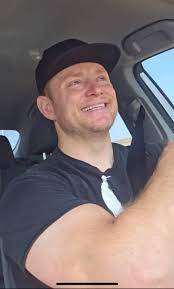 Can someone please make the man in this pic brighter/lighter for me please,  trying to preserve a beautiful memory TIA xx