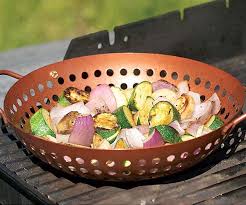 Inside out grilled cheese in the copper chef pan. Test Drive Grilling Baskets Article Finecooking