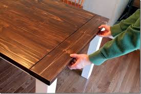 The tapered legs are inset from the corners to allow an overhang for additional surface area. Diy Farmhouse Table With Extension Leaves With Plans Sweet Tooth Sweet Life