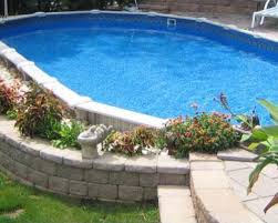 Having pathways leading up to your pool connects it to other parts of the yard (literally) and adds a sense of permanence. Semi Inground Pools In Nutley New Jersey In 2020 Inground Pool Landscaping Backyard Pool Landscaping Above Ground Pool Landscaping