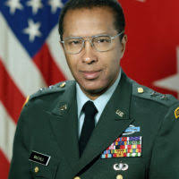 U.S. Air Force Col. Dennis Britten greets well-wishers