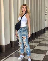 هنا الزاهد hannahelzahed posted on instagram last august take me back to summer please photo by sarrahosnii dec 23 202 in 2021 ripped jean photo summer