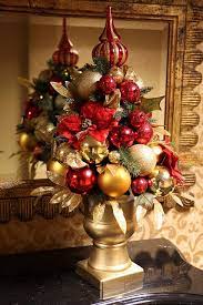 Nothing says celebration like pops of gold. Red And Gold Christmas Centerpiece Christmas Centerpieces Christmas Decorations Gold Christmas