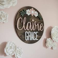 #paperflower #diycrafts #easycraftproject this diy wooden sign project is easy to create with a few supplies from your local craft store. Daisy Baby Name Sign Floral Name Sign Flowers Nursery Etsy Baby Name Signs Baby Girl Nursery Decor Wooden Name Signs