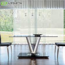 Glass top dining table simple, clean, and functional, this modern glass dining table will work wonders in a dining area. China Stainless Steel Base Square Tempered Glass Top Dining Table China Glass Dining Table Furniture