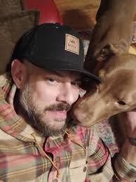 This handsome young man's name is Jack Bear. He is our newest fur-ball and  is loving spending time with all the other doggos.