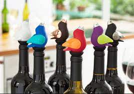 I have the dispenser tops, candles and tiki torch inserts for. Chirpy Top Wine Pourer The Mole Hole