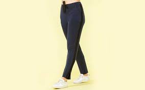 These capris are made of black cotton twill with teal buttons on the pockets and at the leg opening. The Best Travel Pants For Women Who Hate Flying In Jeans Travel Leisure