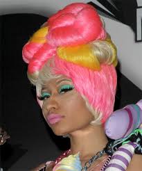 All four of minaj's albums have now gone platinum in the u.s. Nicki Minaj Long Curly Light Platinum Blonde And Pink Two Tone Updo With Layered Bangs And Yellow Highlights