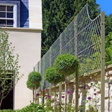 Available in tan and green. Wall Top Trellis Panels Posts Garden Requisites
