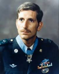 Chicagoan Frank Witek served as PFC in the US Marine Corps. At the Battle  of Finegayan in Guam, his unit was trapped and outnumbered by a Japanese  advance. Witek held off the