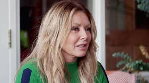 Carol Vorderman becomes emotional when she revisits step dad's home