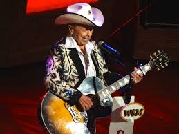 Although he never had a consistent presence on the charts, he managed to have hits in every decade between the 1940s and the 1970s, and he became one of the grand ole opry's most popular performers. Little Jimmy Dickens Music Row Girl