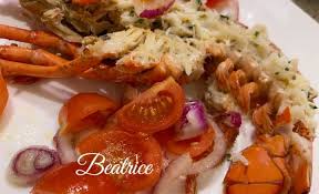 1 astice da 700 g, cipolla, aceto, pomodori, olio. Astice Alla Catalana Spezie Org