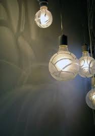 Craft Idea Light Bulbs Made With Rubber Bands And Spray Paint Bulb Painted Light Bulbs Light Bulb Chandelier
