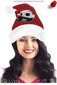 Christmas Santa Hat Soccer Ball And Shoe Red Santa Style Hat Pom Pom Beanie By Gravityx9 At Artsadd Trendy Winter Wea Xmas Fashion Santa Hat Hat Designs
