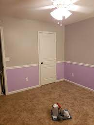 The framing matches the crib and gives a cutely cohesive look to this nursery. Nursery With Chair Rail Cheap Online