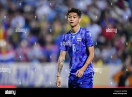 Korawich Tasa of Thailand seen in action during the Sea Games 2022 Group B  match between Thailand and Singapore at the Thien Truong Stadium.(Final  score; Thailand 5:0 Singapore Stock Photo - Alamy