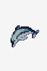It is a black and white symbol pattern. The Dolphin Cross Stitch Pattern