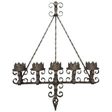 Check spelling or type a new query. Spanish Revival Brutalist Iron Gothic Wall Sconce 5 Light Candle Candelabra For Sale At 1stdibs