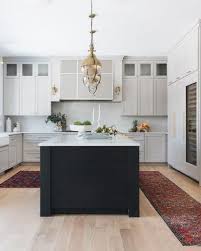 The Best Black Paint Colors For Your Kitchen Cabinets Black Kitchen Island Black Paint Color Kitchen Remodel