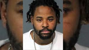 Man arrested after allegedly attacking customer in store