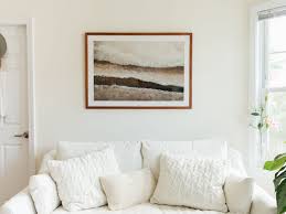 It's a more organic and neutral look, which fits in with this space, but. How High To Hang Pictures