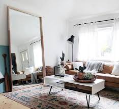 Whether you simply have too much space to properly decorate or your collection of art is on the small size, finding the perfect way to spruce up these empty spots may take a bit of planning. Mirrorzone Ie Do You Have A Large Wall In Your Living Room You Don T Know What To Do With Decorate A Large Wall In The Living Room Like A Pro With A