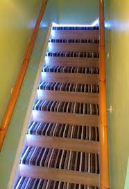Carpet And Laminate Wood On Stairs Laminate Stairs Carpet Stairs Stairs Covering