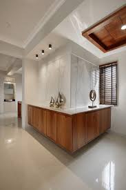 Away from the hustle bustle of city life these premium flats in south kolkata offer the best luxury living amidst nature. 2 Bhk Interior Design Studio 7 Designs The Architects Diary Foyer Design Apartment Interior Interior Design
