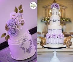 A white cake with a ruffled and a silver tier, bold flowers on top gold and white wedding cake with berries for a fall wedding glam white, silver and purple rose cake Purple Lilac Lavender Wedding Cakes Cake Geek Magazine