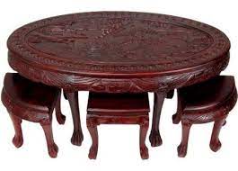 Add style to your home, with pieces that add to your decor while providing hidden storage. Oriental Carved Oval Coffee Table With Stools Coffee Table With Stools Oval Coffee Tables Coffee Table