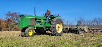 Image result for Yellow 1972 Tractor