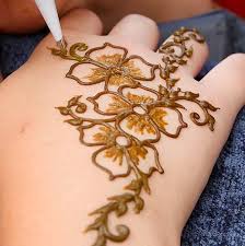 The details and tiny dots of this piece make it a tattoo to marvel at. Photos Painting Henna Tattoos At Buckley Park