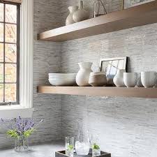 Adding a shelf floating above the toilet is an easy way to add a little charm to the tiny bathroom. Marble And Brass Wall Shelves Design Ideas