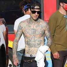 I tattoo, she captioned the post that included a few photos of her inking a message onto travis and a video clip from the. Travis Barker Reveals A Tattoo Of Kourtney Kardashian S Name